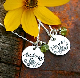 two round stamped pendants on one chain