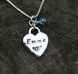 small stamped silver heart