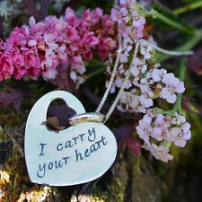 I carry your heart necklace....