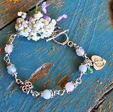 Tiny Footprints™ Miscarriage Bracelet with Peridot Birthstone